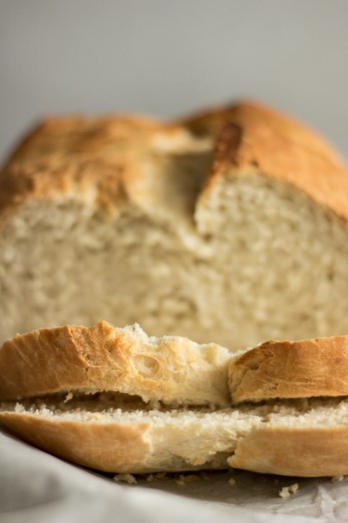 close up on slices of pilsener beer bread, just baked, with crumbs