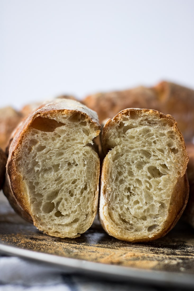 Poolish baguette sliced in half.