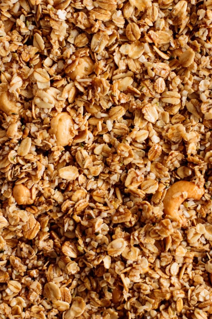 granola ingredients mixed ready to be baked