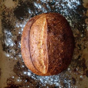 baked sourdough bread for beginners just out of the oven