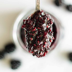 a spoon full of blackberry jam