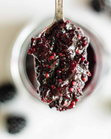 a spoon full of blackberry jam