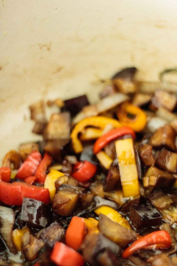 caponata cooking on pan