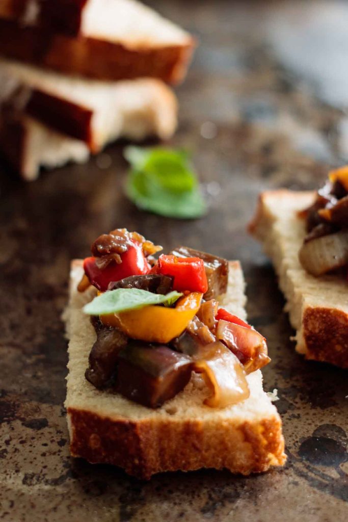 close up on caponata toast