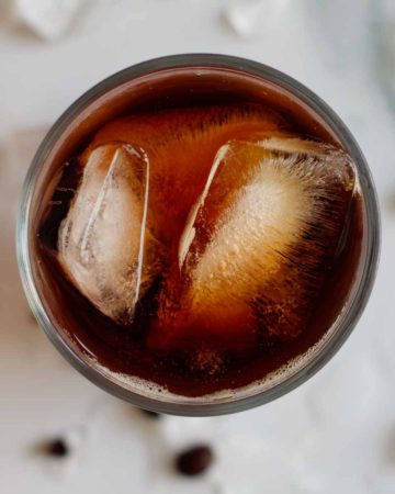 cold brew coffee in a glass full with ice seen from above