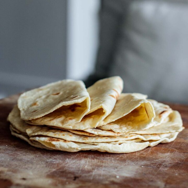 a stack of sourdough tortillas