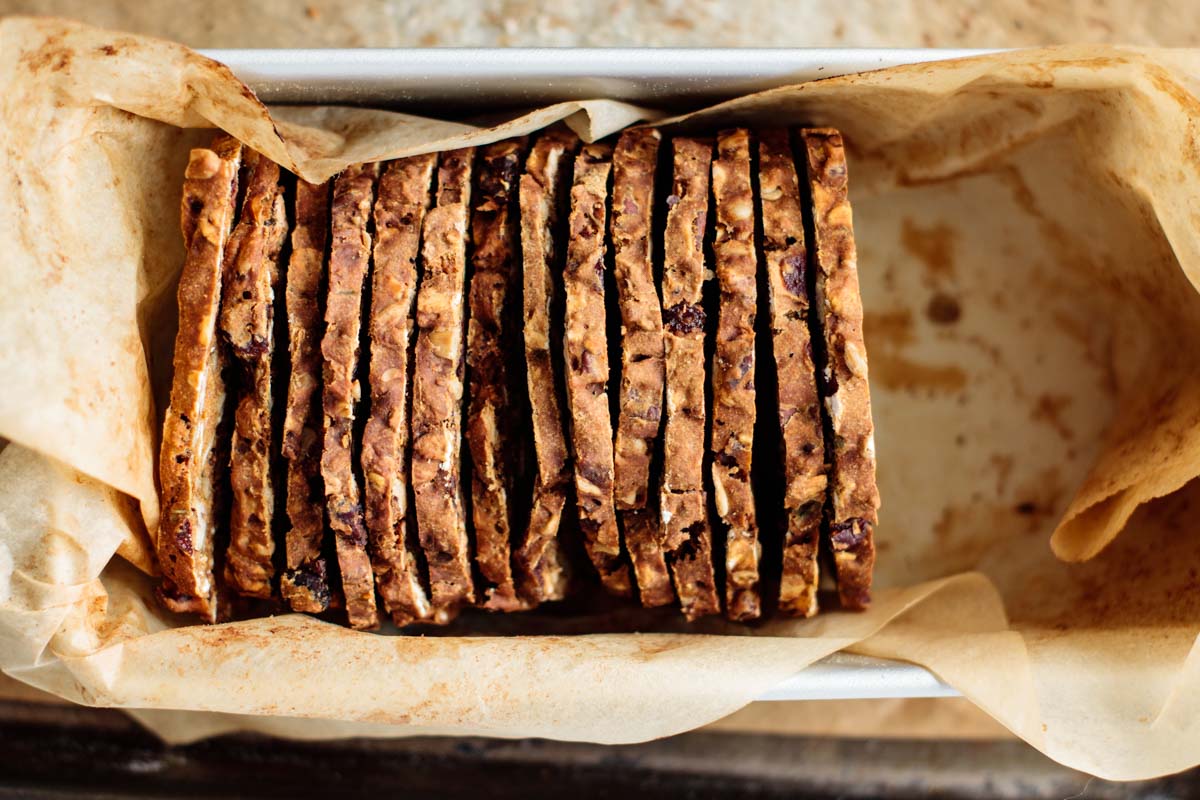 sourdough gourmet crackers inside a loaf pan with parchment paper