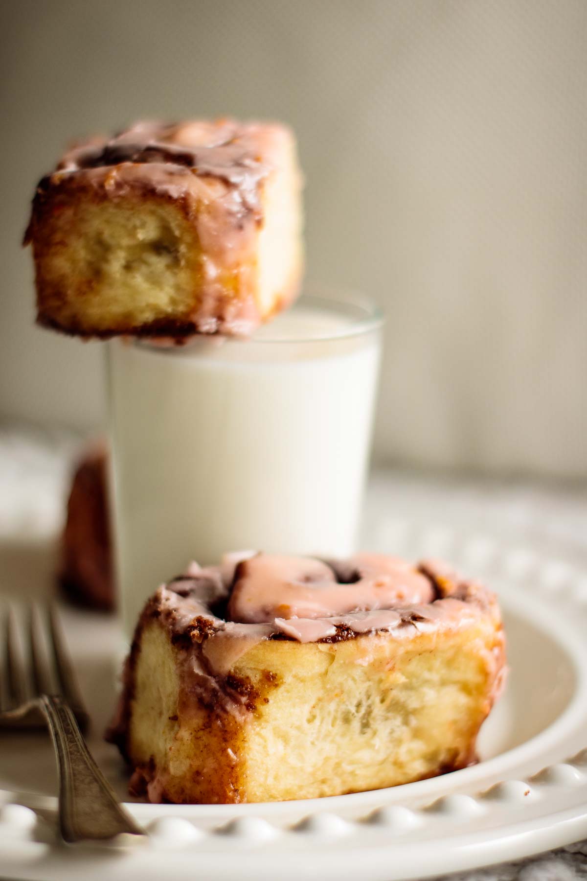 rolls and a glass of milk