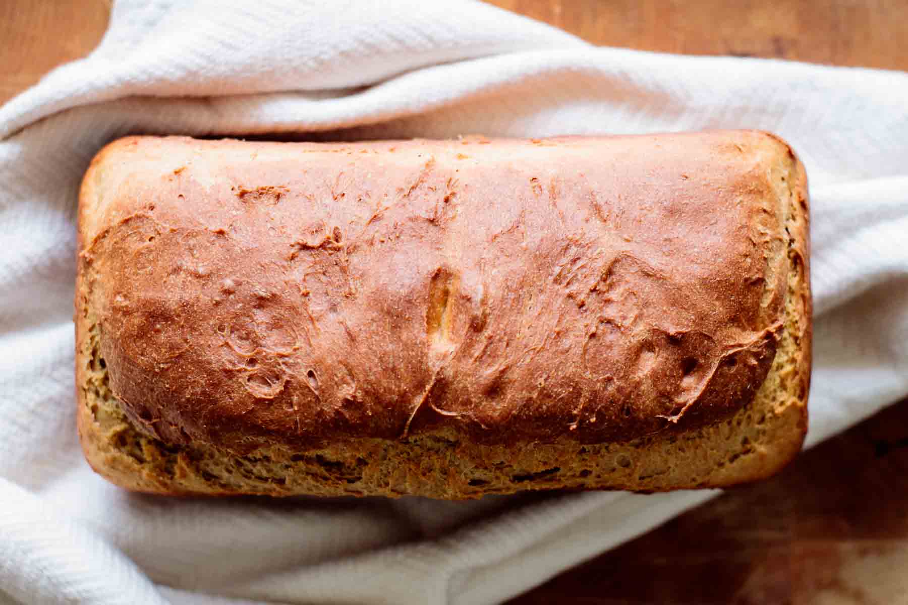 bread resting on a kitchen towel