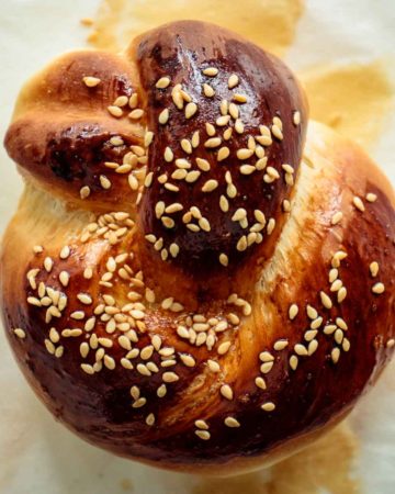 close up of a challah roll, just baked