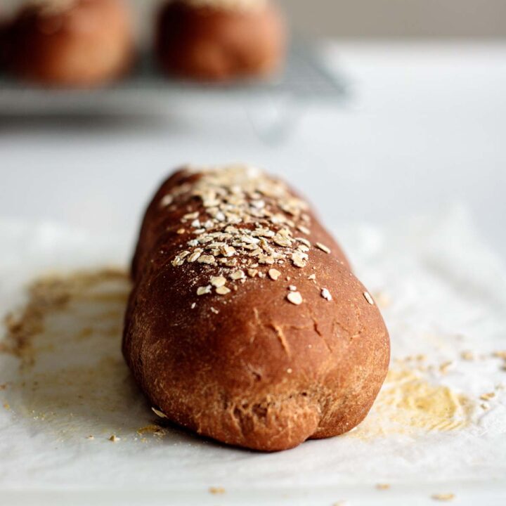 cheesecake factory brown bread toped with oats, cooling