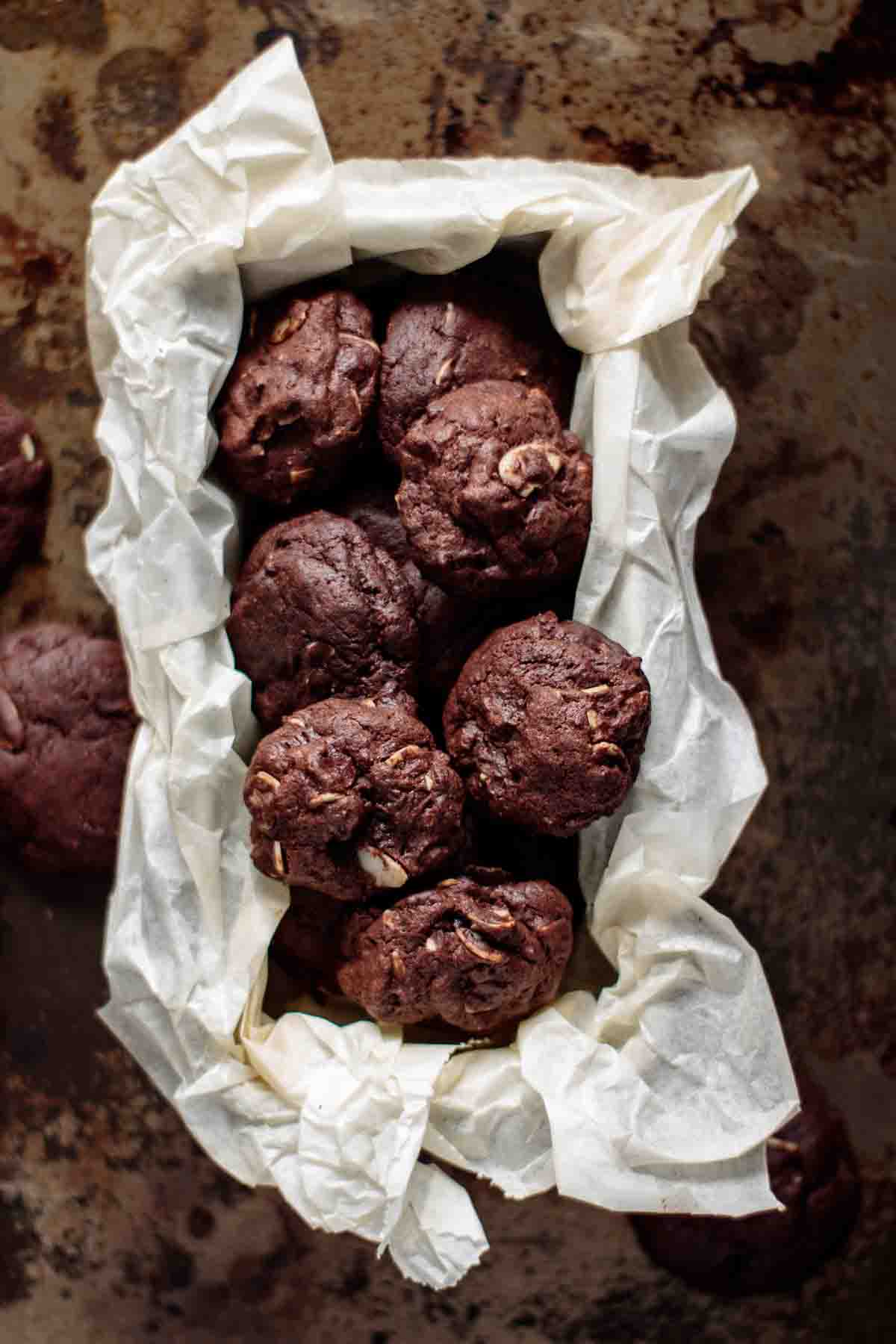 A box full of double chocolate almond cookies.