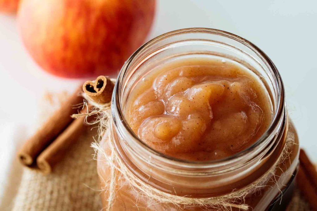 apple butter stored inside a glass jar