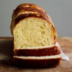 sourdough brioche bread sliced, showing its crumb soft interior