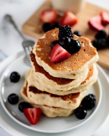 sourdough pancakes made with discard and served with berries