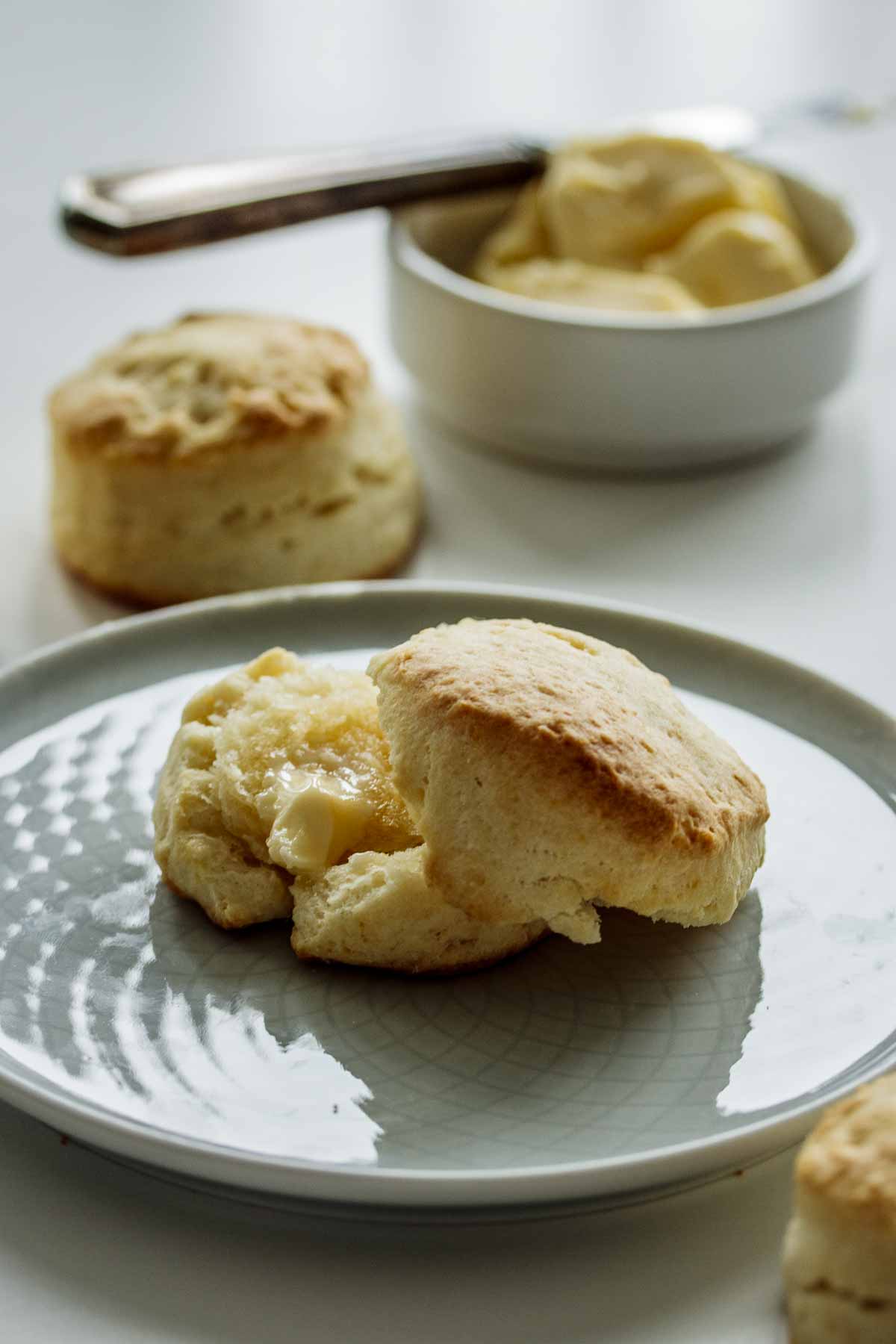 Biscuit sliced open, with melting butter.