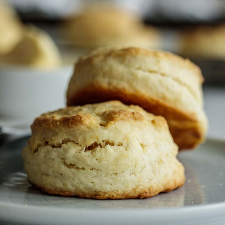 Two biscuits on a plate.
