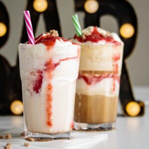 Cream and coffee versions of strawberry funnel cake frappuccino.