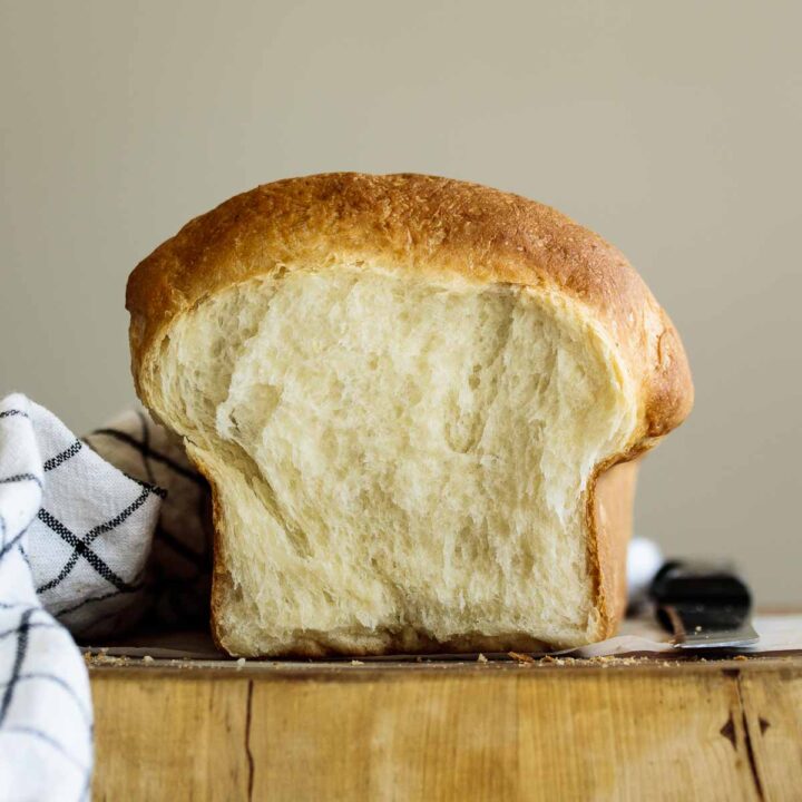 Vegan brioche bun sliced showing its crumb.