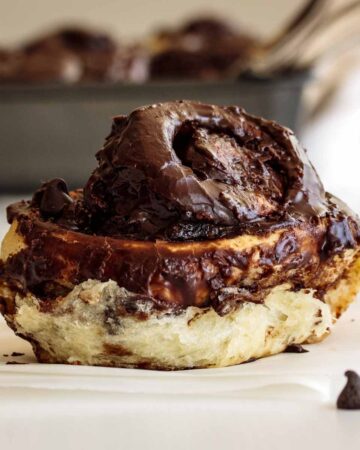 A single chocolate roll over a napkin.