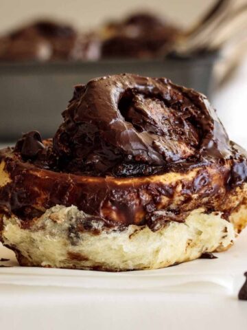 A single chocolate roll over a napkin.