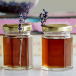 Two jars of lavender extract.