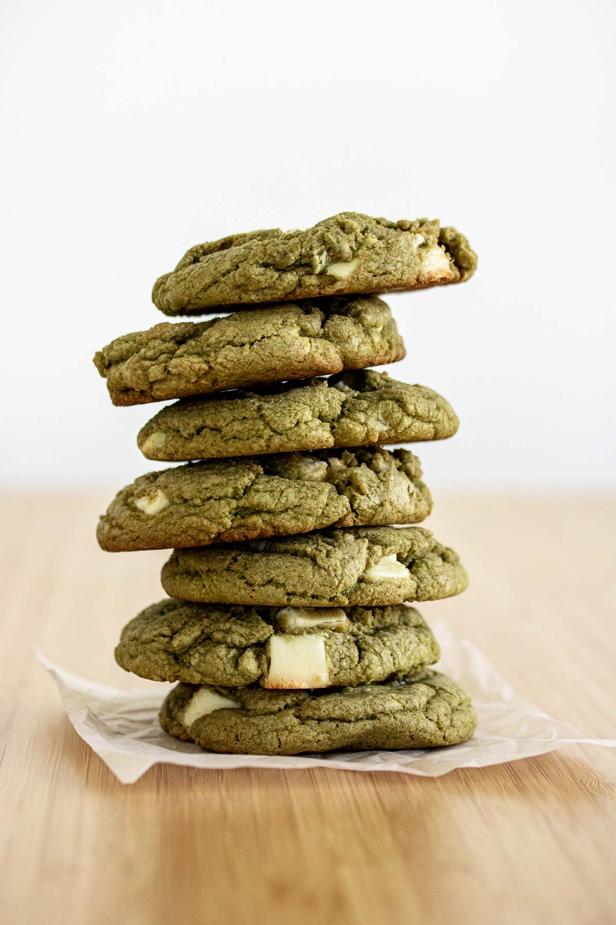 Baked matcha cookies with white chocolate chips.