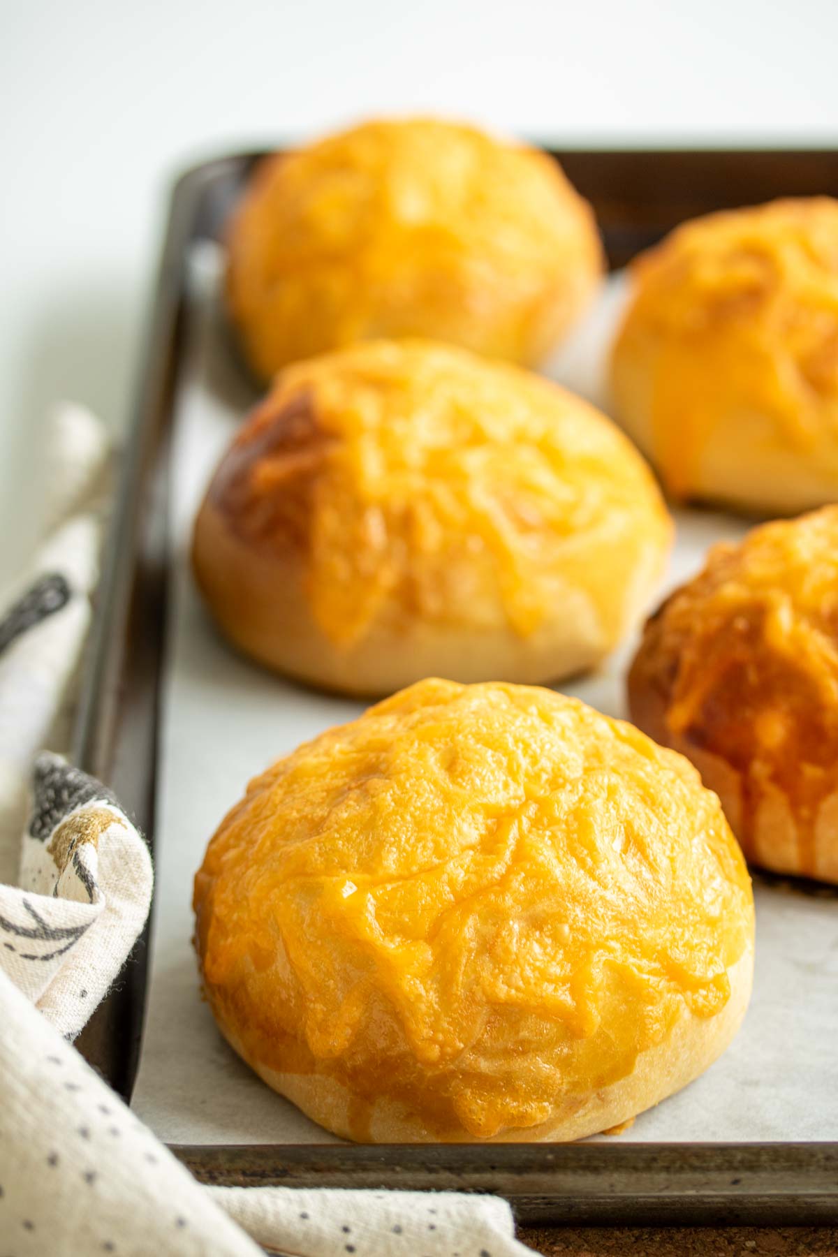 Baked cheddar cheese buns.