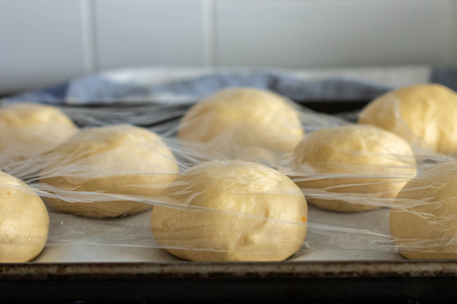 Shaped buns, covered.