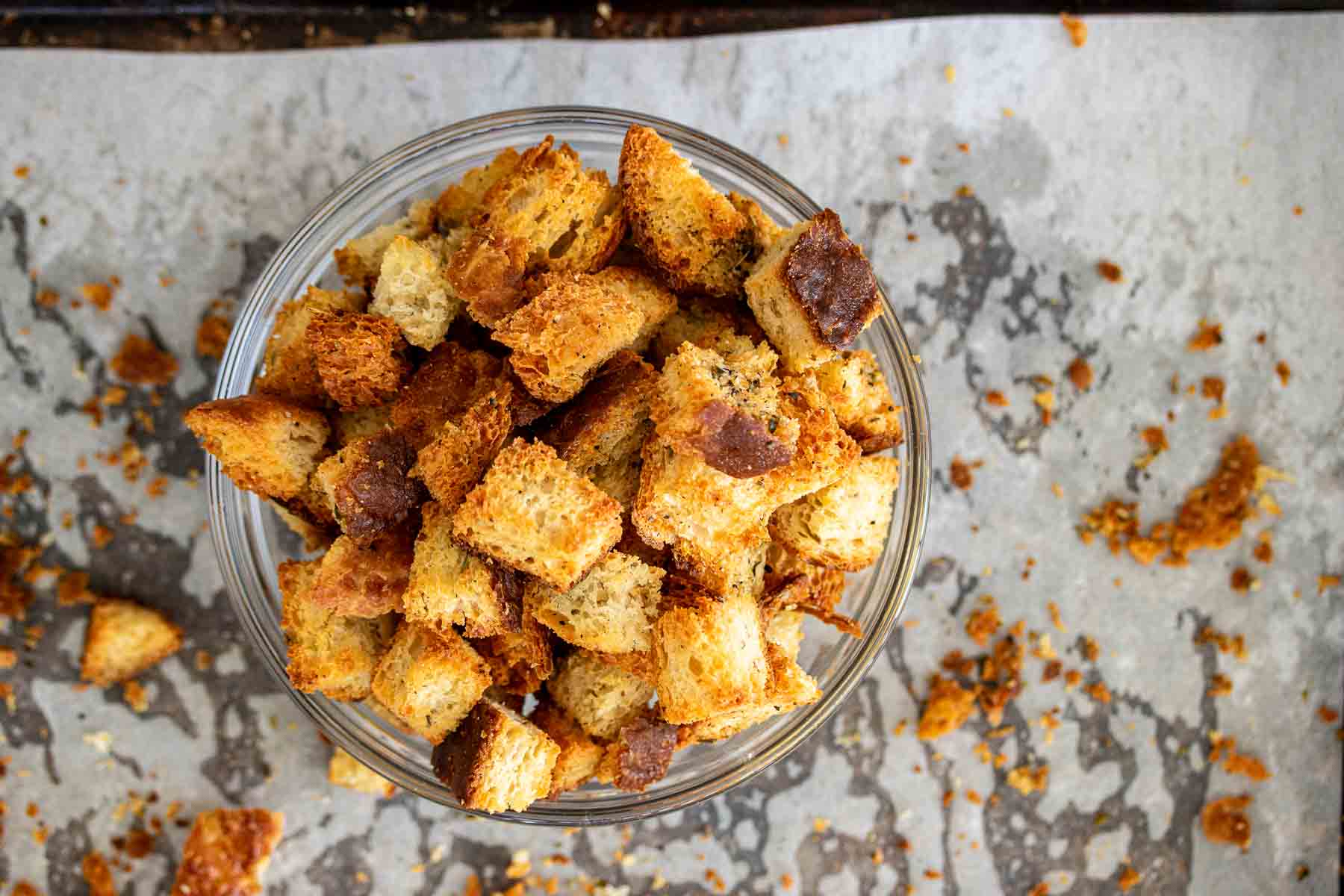 Baked croutons made with stale sourdough parmesan bread.