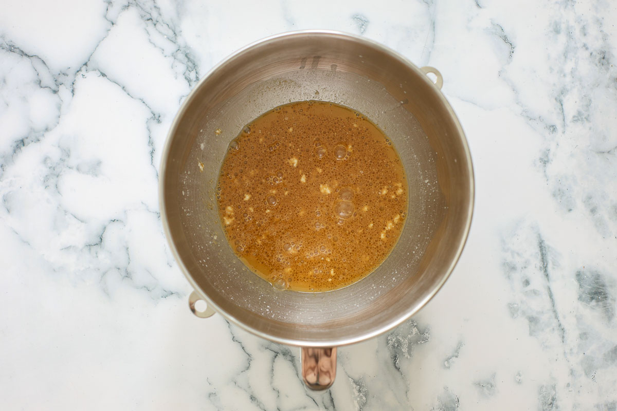 Wet ingredients of this recipe in a metal bowl.