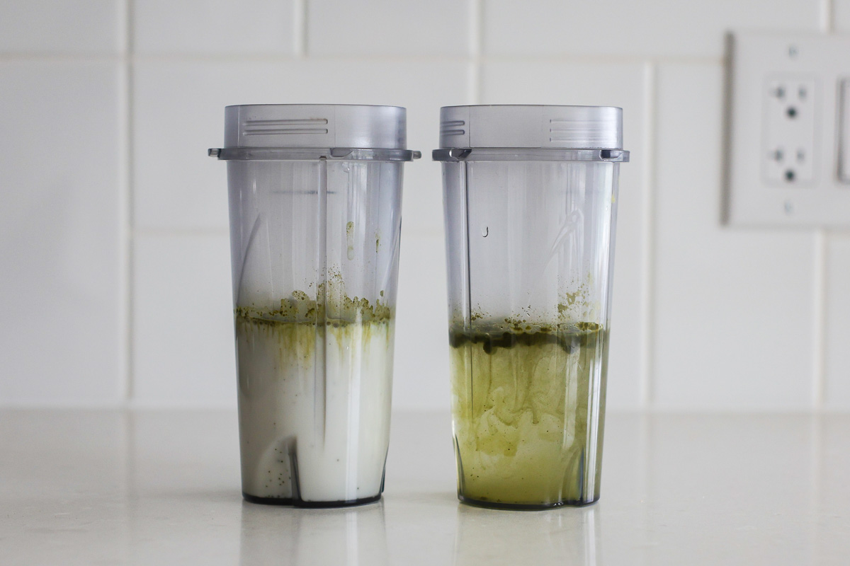 Two transparent jars: one with water and matcha powder, one with milk and matcha powder.