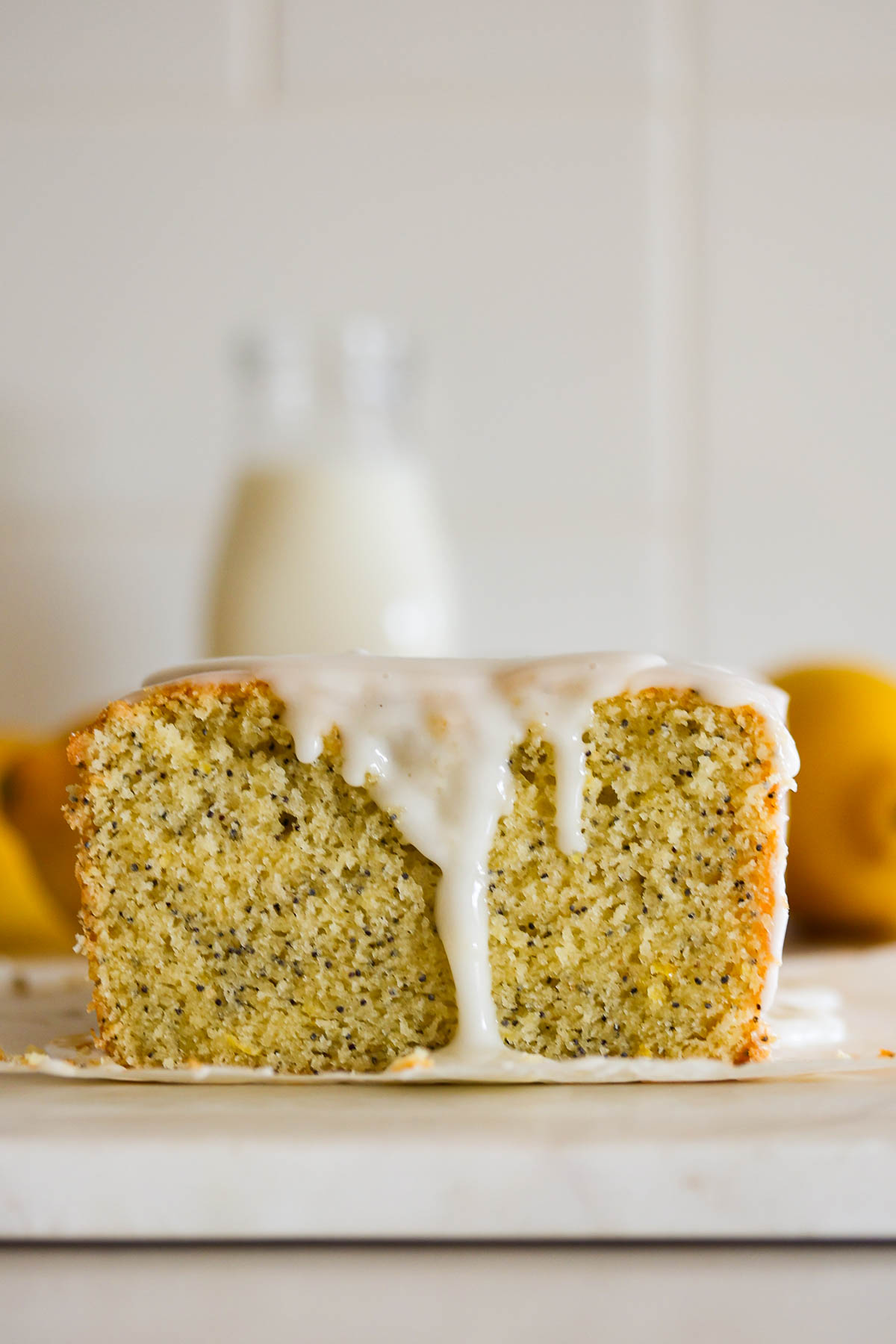 The crumb of a sourdough lemon pound cake, with glaze.