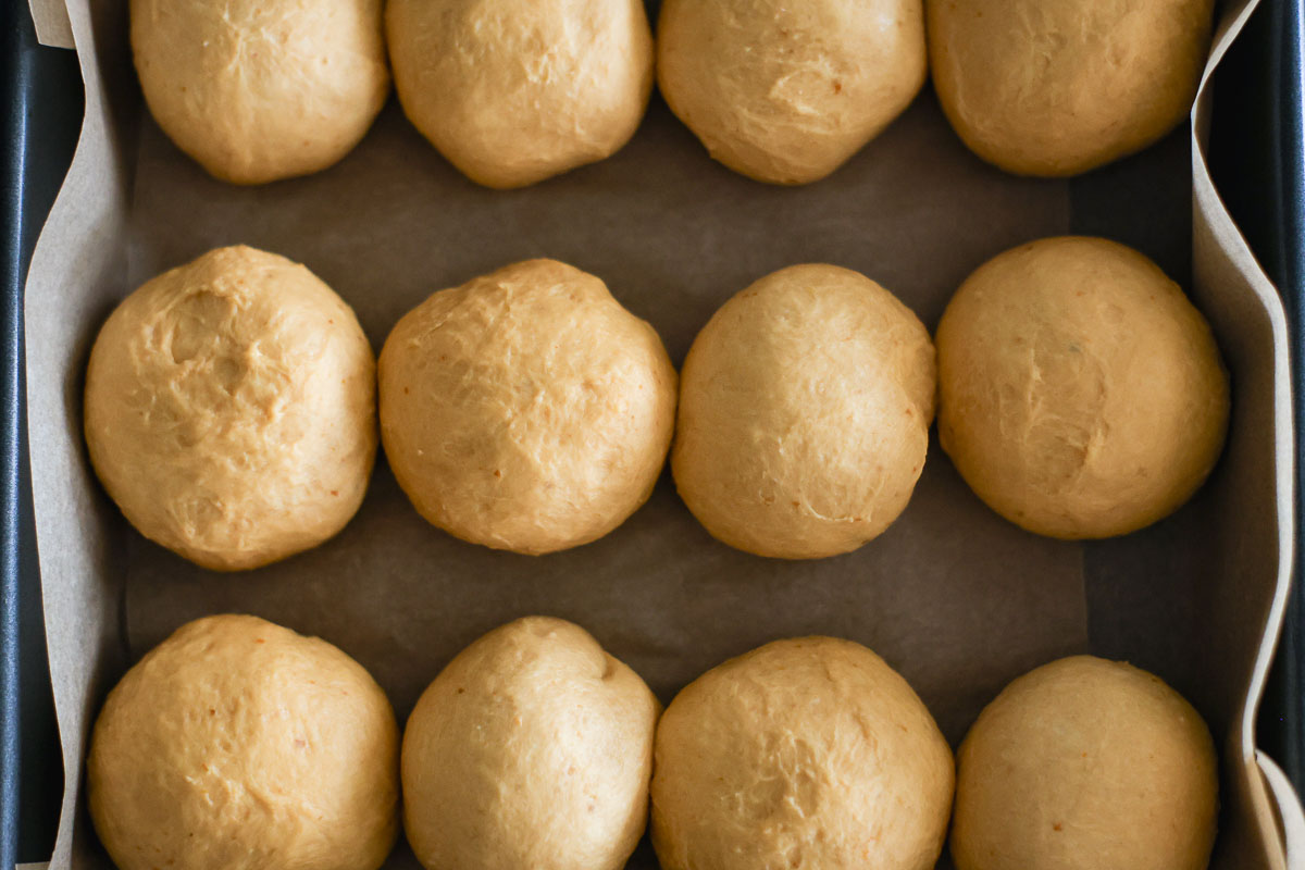 Ball rolls in a lined baking pan.