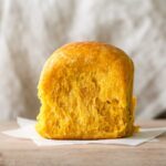 A sourdough pumpkin dinner roll.