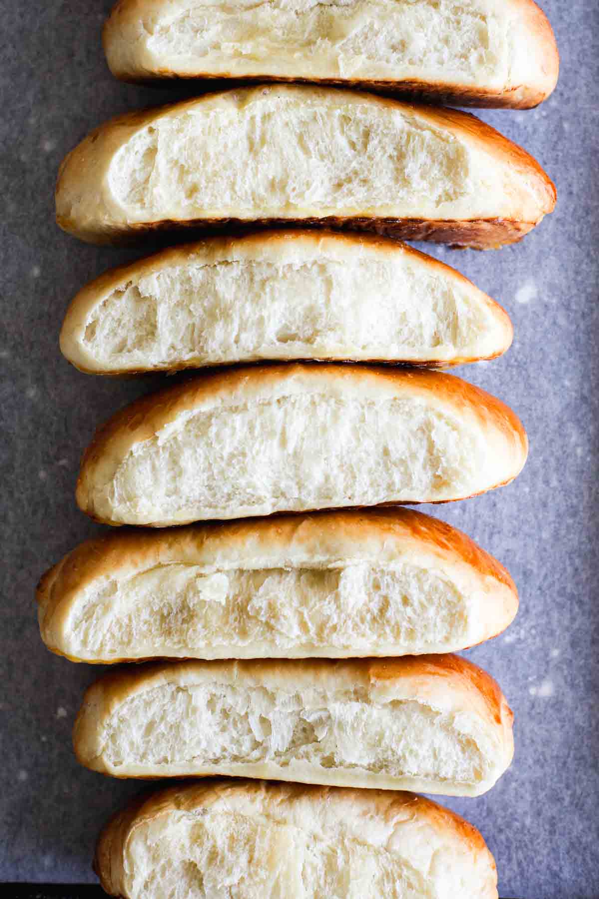 Dump the sourdough rolls into a baking pan.