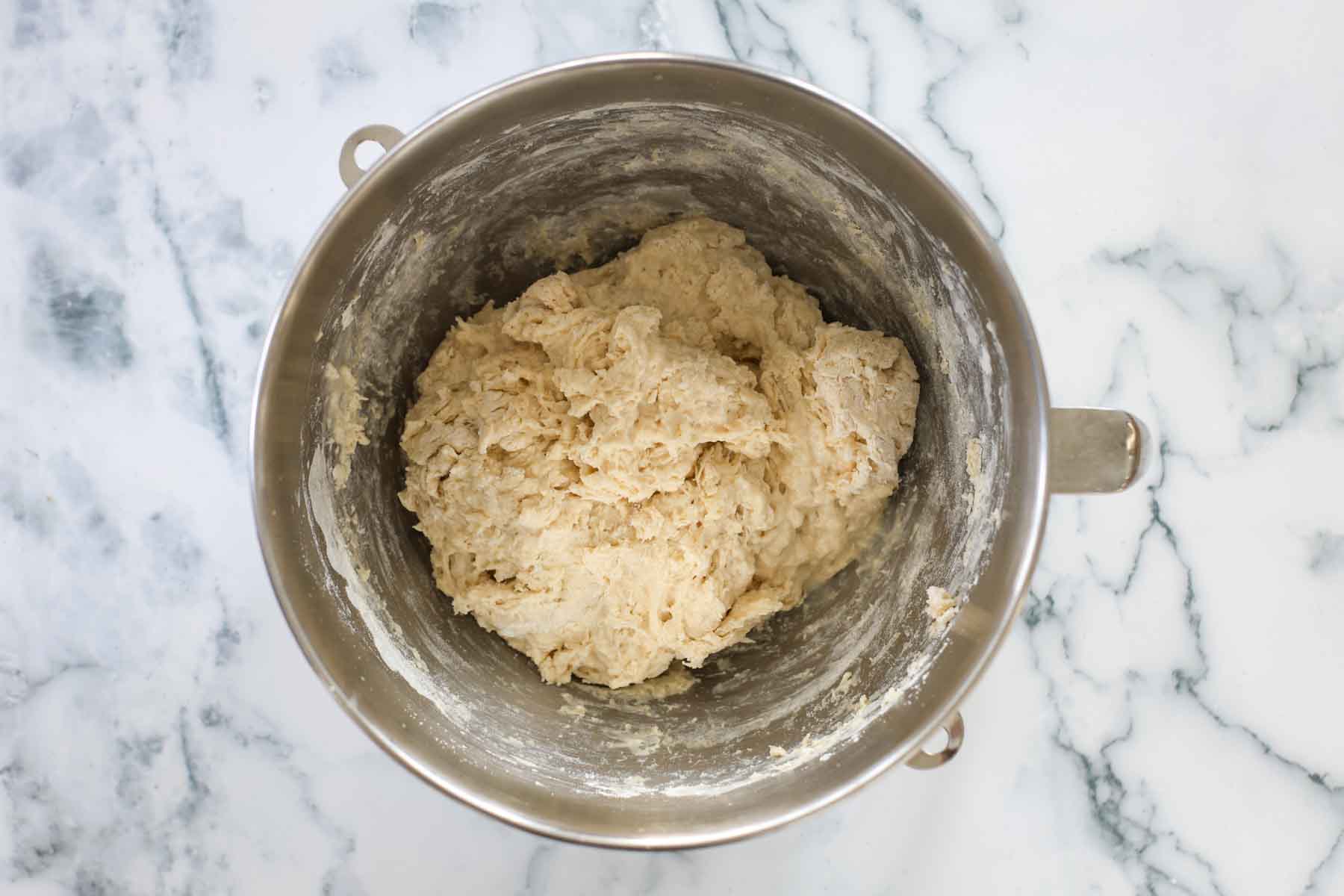 Knead the dough in a metal bowl.