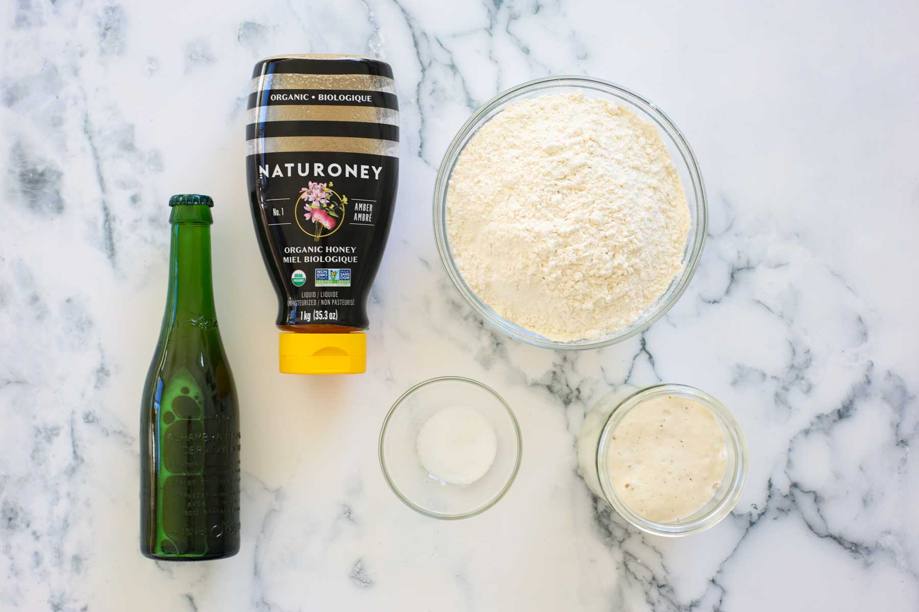 Ingredients of this recipe: beer, honey, flour, salt and sourdough starter.