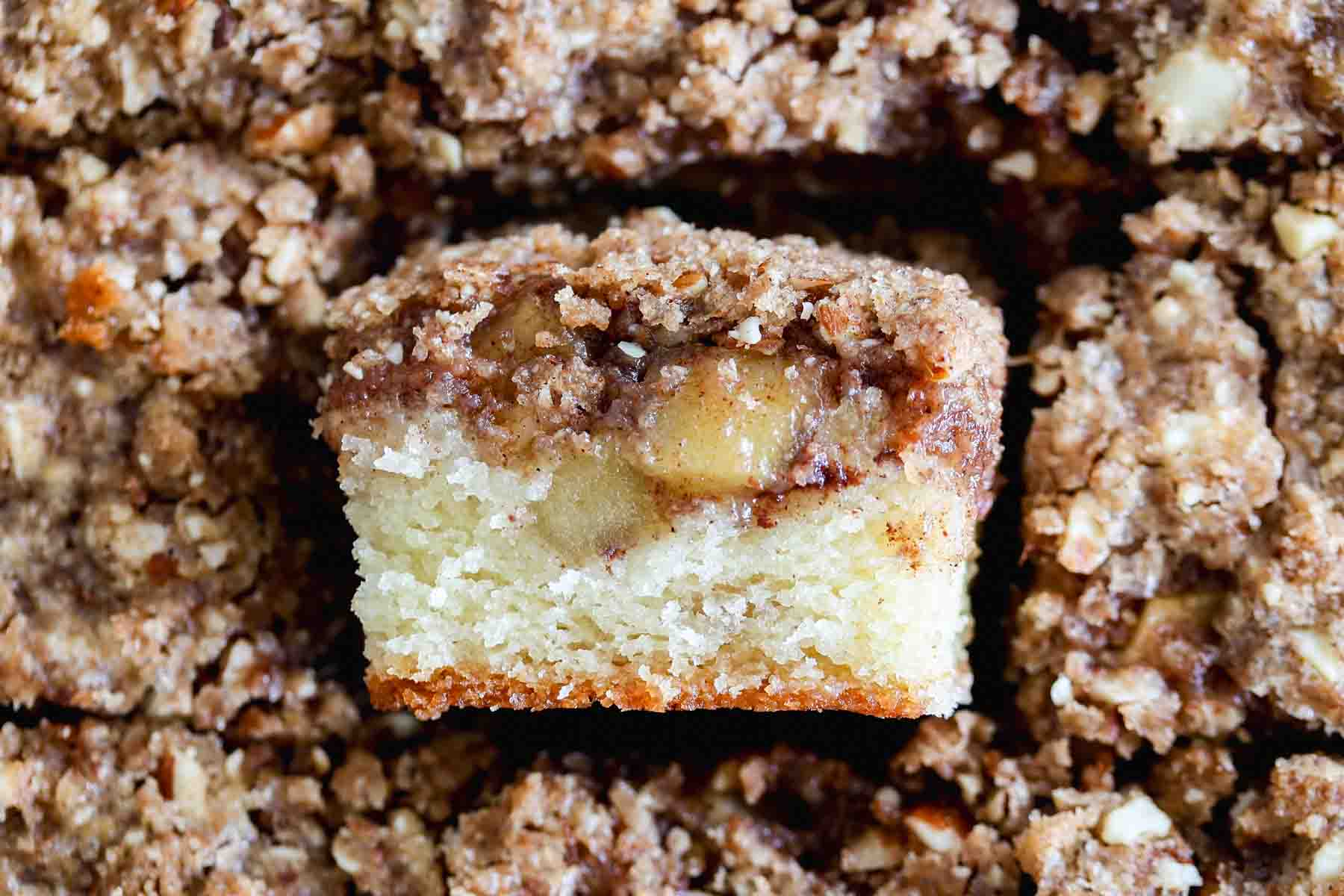 Sliced apple cinnamon coffee cake with sourdough coffee cake.
